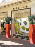 2 Orange Curvy Planters in-situ