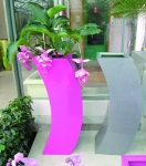 Pink and silver/Grey Curvy Planters in-situ